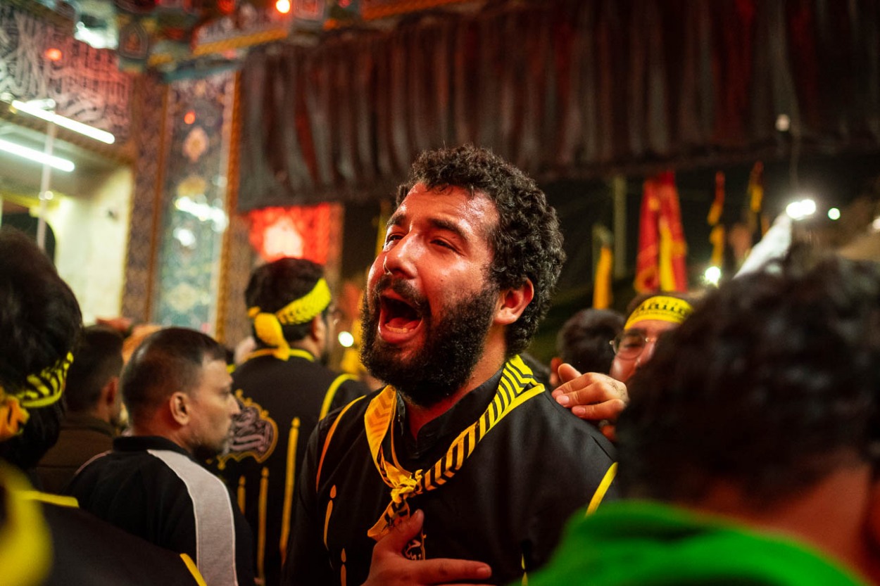 A brother of the Heyat Honar brotherhood express his pain as he leaves the Imam Hussein Mausoleum in Karbala, Iraq